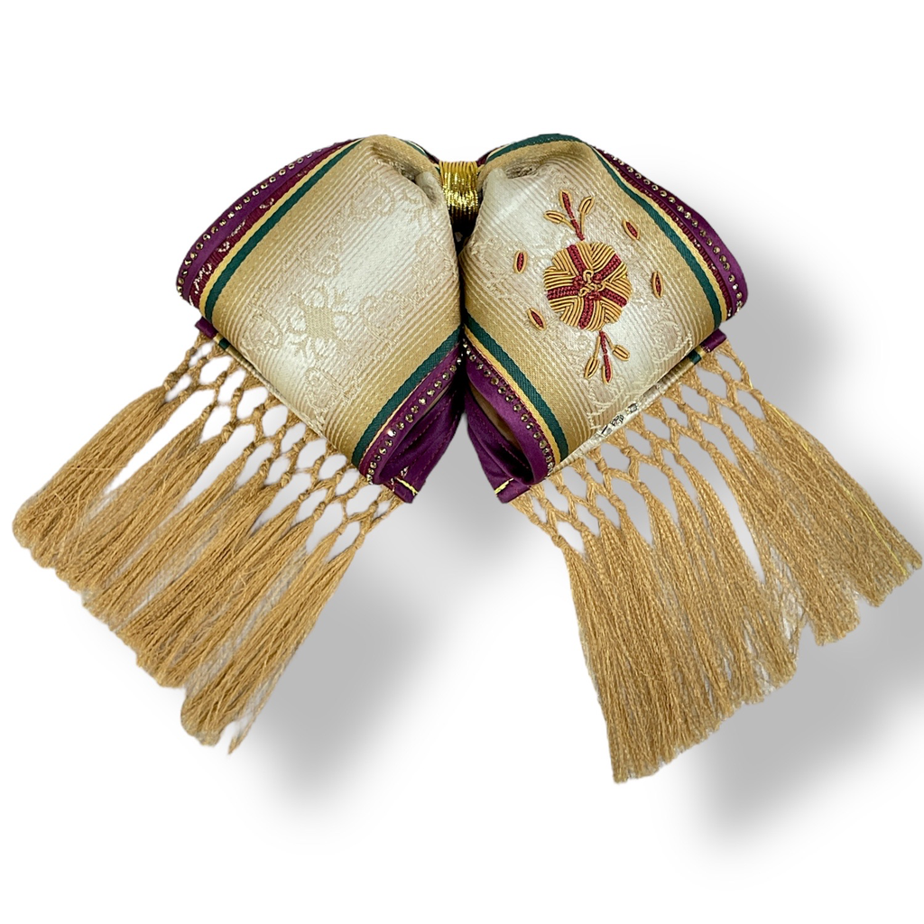 MOÑO DORADO BORDADO EN CANUTILLO ADULTO