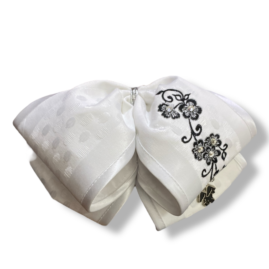 MOÑO BLANCO CON BORDADO ADULTO