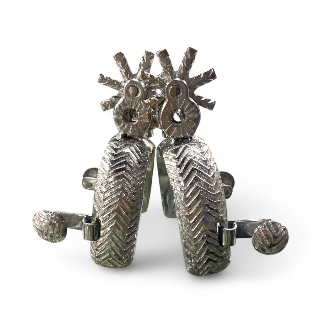 ESPUELA ESCARVADA CON RODAJA ALMENDRADA