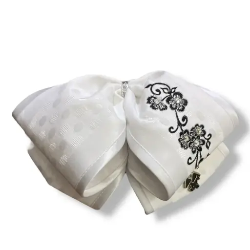 MOÑO BLANCO CON BORDADO ADULTO